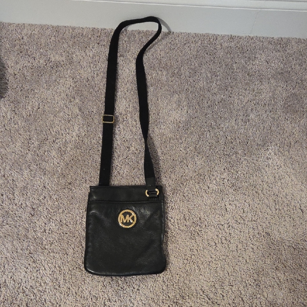 Michael Kors Black Messenger Bag with Gold Emblem
